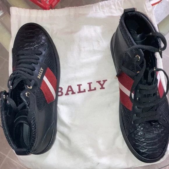 Bally Shoes size 10 ..mostly all black with 2 red stripes and one white stripe